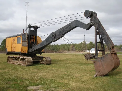 Excavator with a specialty attachment