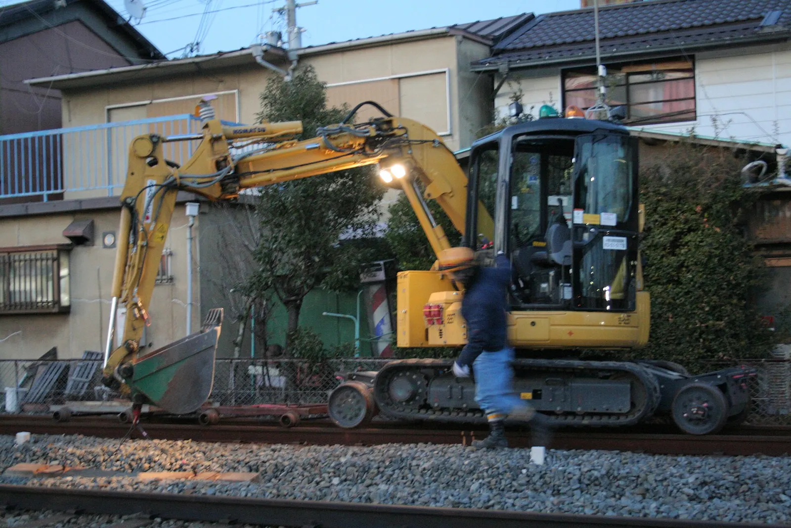 Compact excavator on a job site