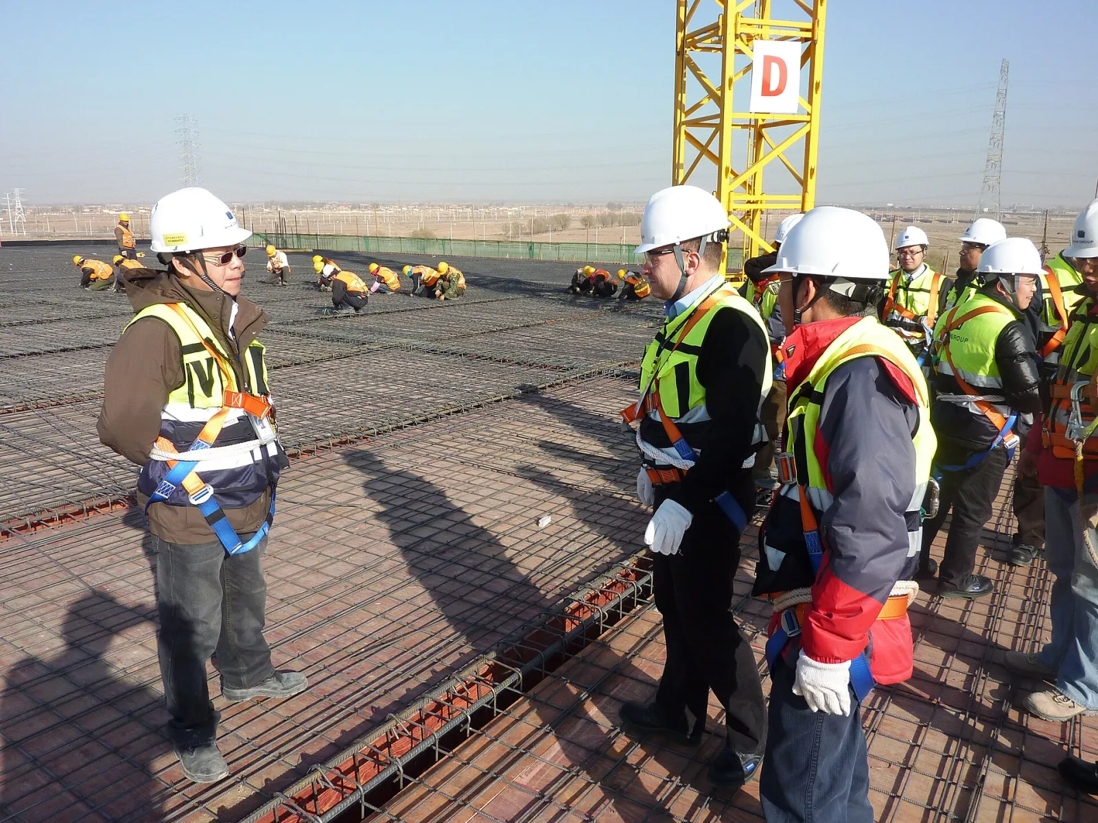 Construction workers in high-visibility safety gear