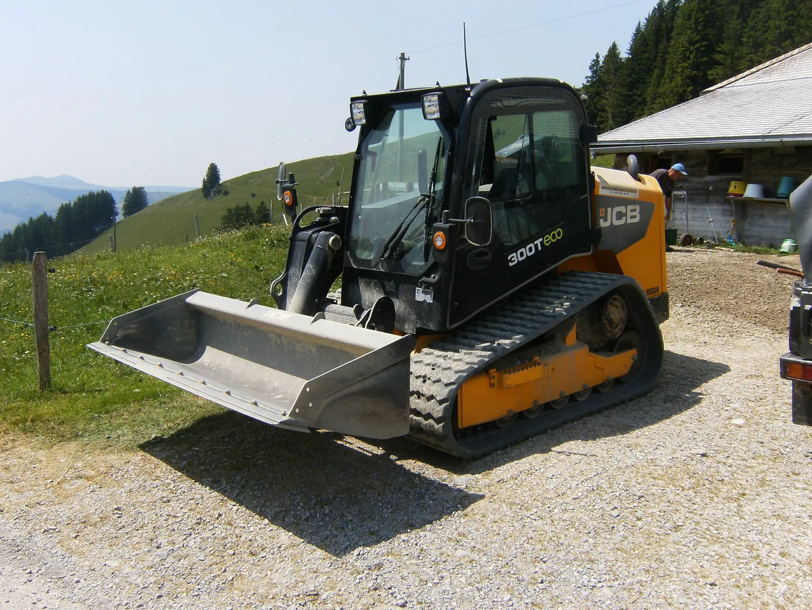 Compact track loader with a bucket