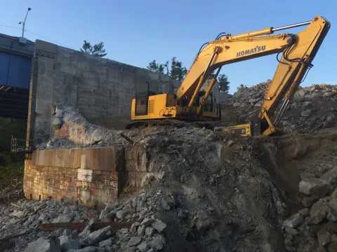 Used crawler excavator working in a pit