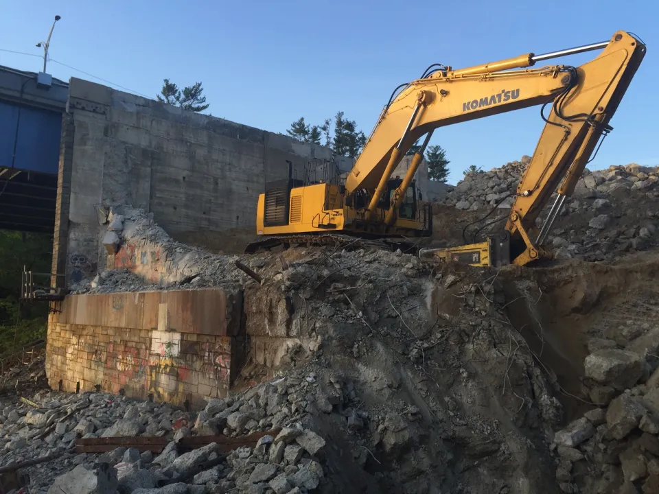 Used crawler excavator working in a pit