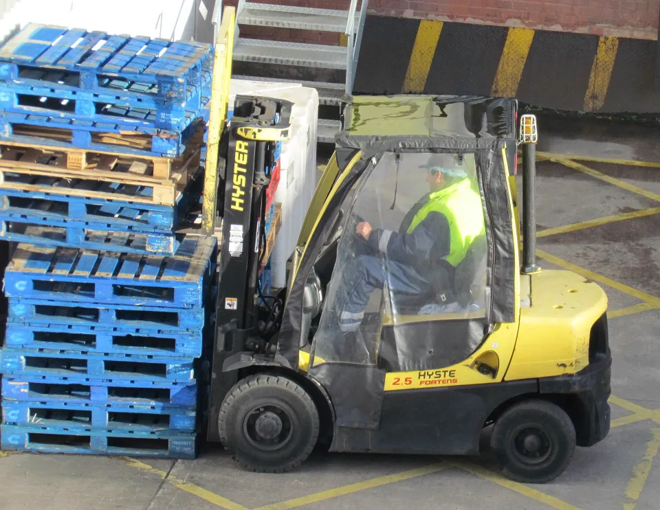Hyster forklift handling pallets
