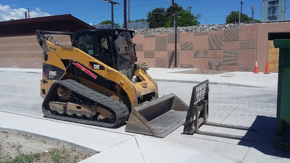 Compact track loader with pallet forks