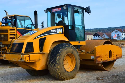 Caterpillar vibratory soil compactor (CS663E pictured)