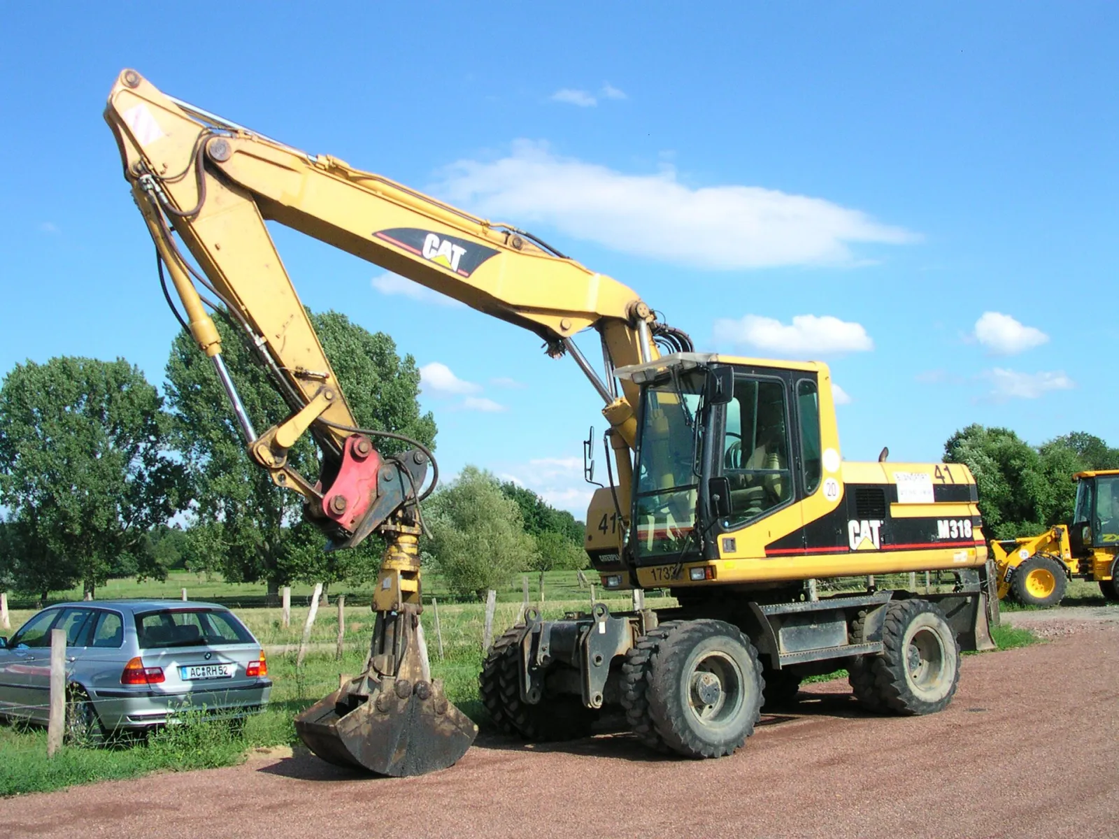Caterpillar M318 wheeled excavator