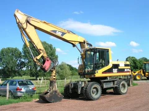 Caterpillar M318 wheeled excavator