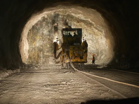 Face drilling jumbo working in a tunnel
