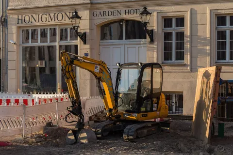 JCB mini excavator working in a narrow street (804 model pictured)