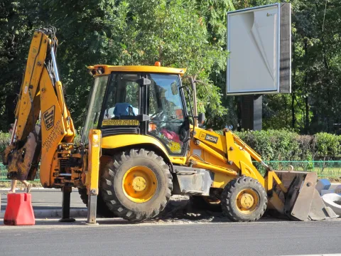 JCB 3CX backhoe loader standing on its stabilisers