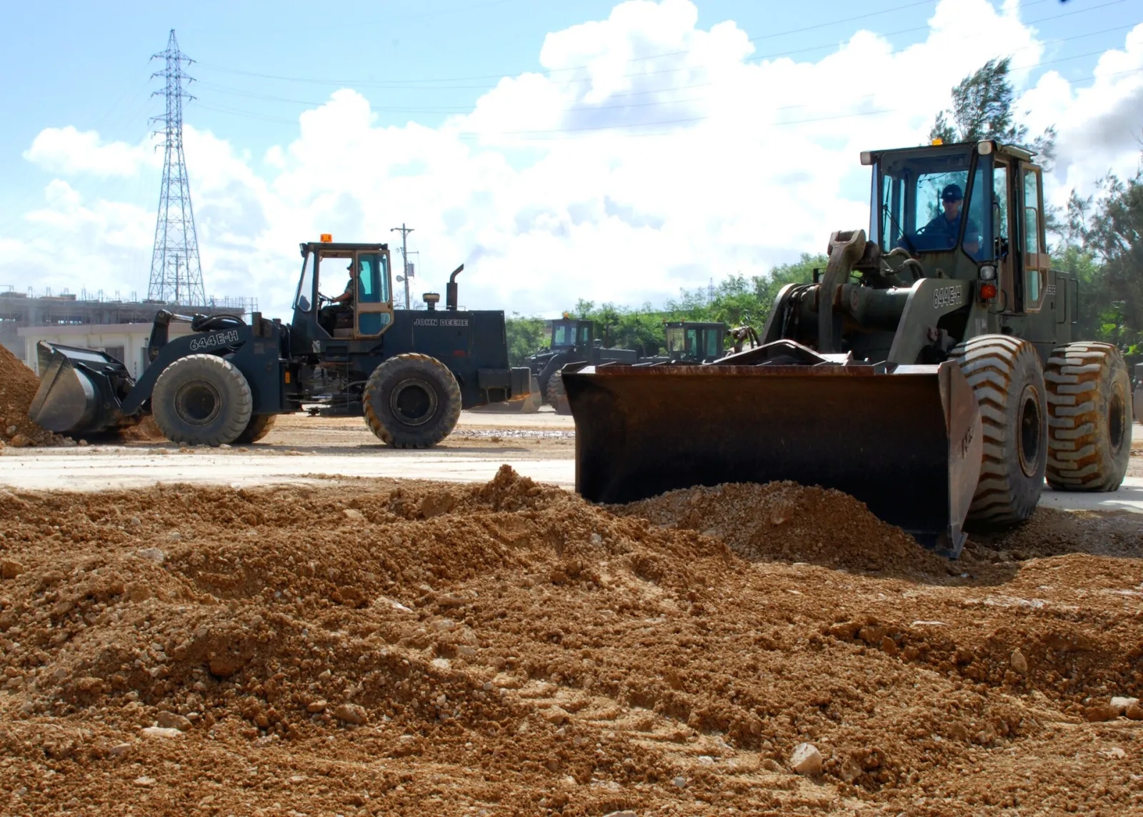 John machine similar to the John Deere 644 P-Tier (related model may be pictured)