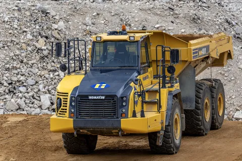 Komatsu HM400 articulated dump truck in a quarry