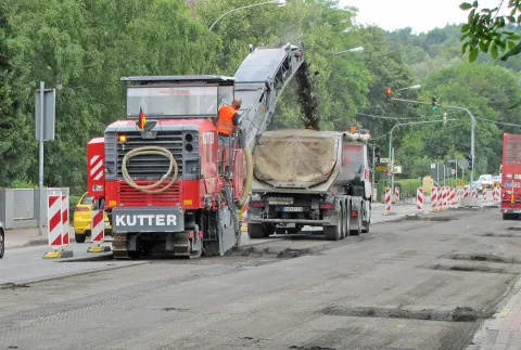 Wirtgen W 210 cold milling machine removing asphalt