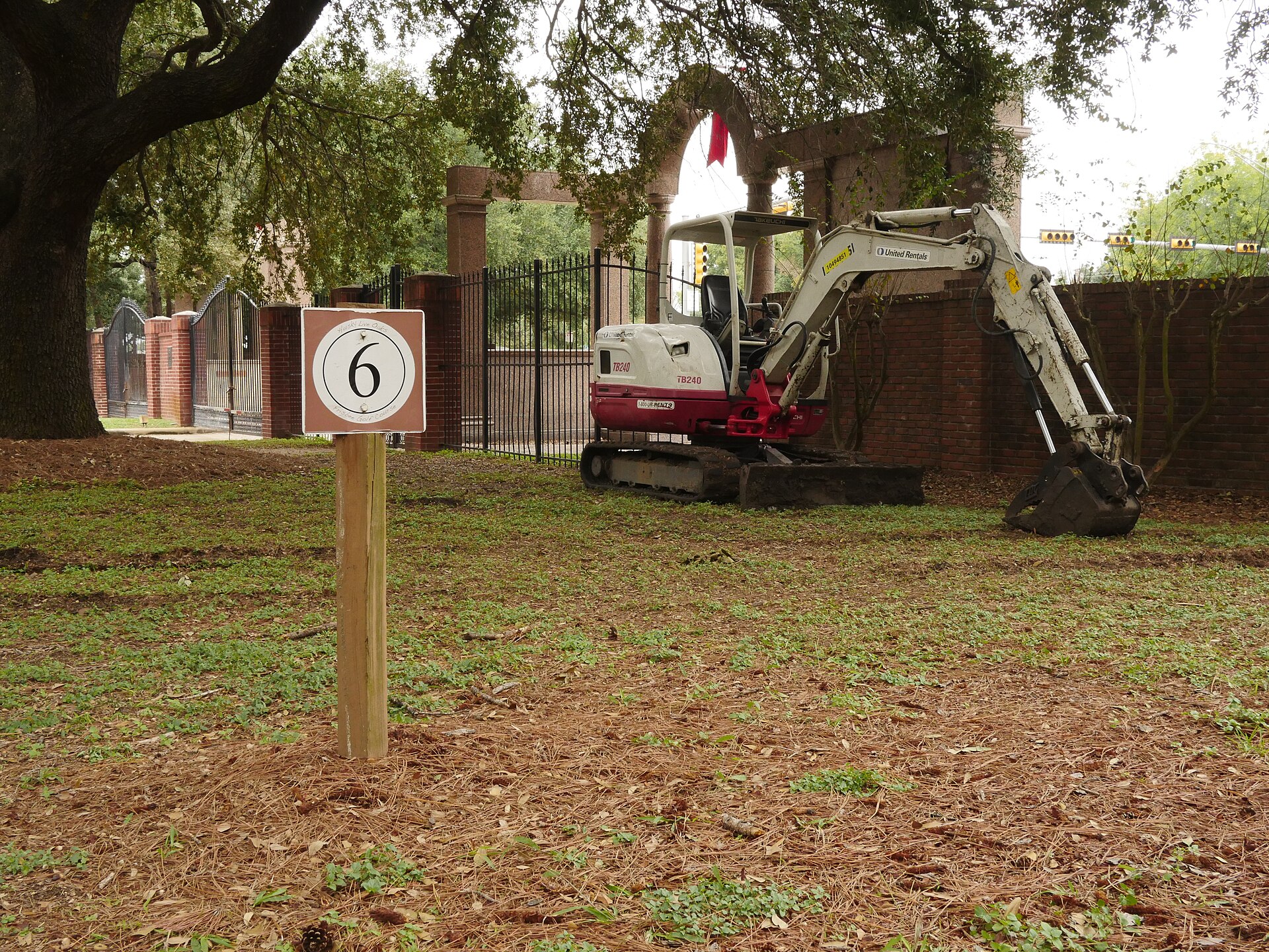 Takeuchi TB240 compact excavator at work